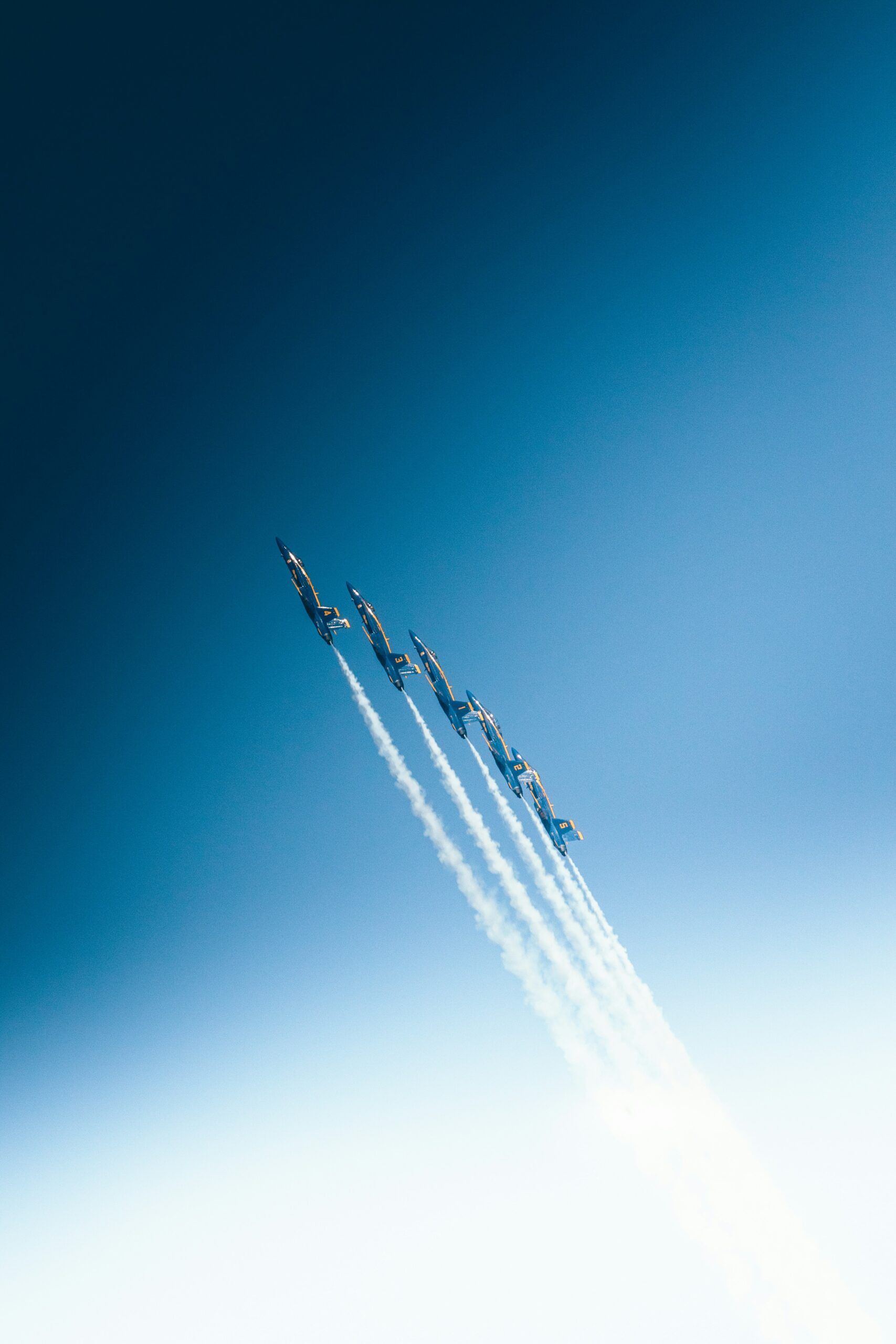 five jet flying in sky